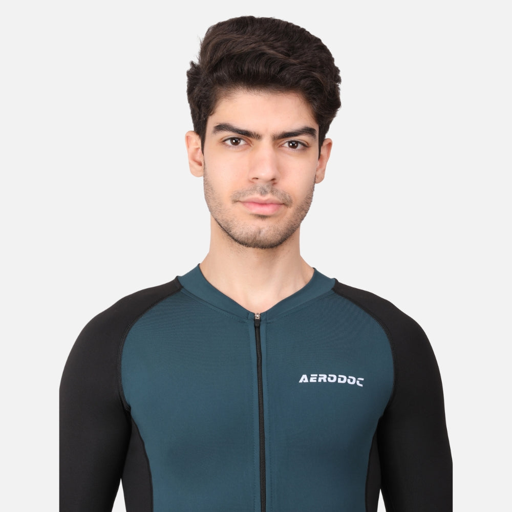 Aerodoc logo on the Mineral Green Triathlon Suit, representing premium quality and professional sportswear branding.
