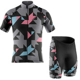 Cycling jersey and shorts with geometric pattern on a white background