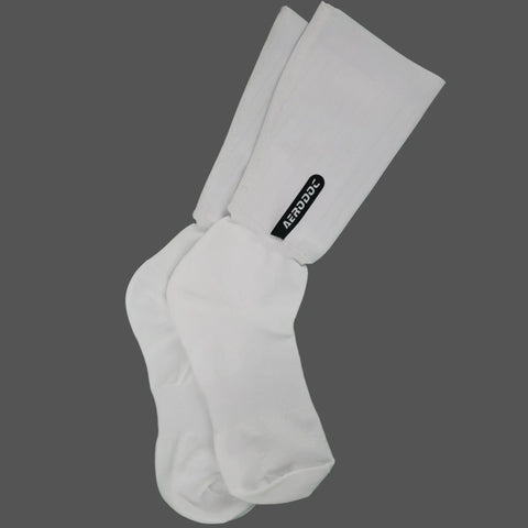 A pair of white crew socks with a black 'AERODOLS' brand tag on the leg, displayed against a solid dark gray background.