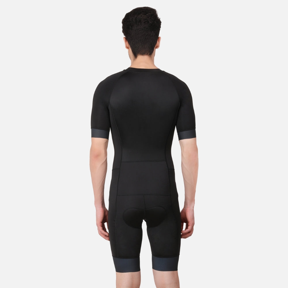 Back view of the Aerodoc Black Men Triathlon Suit in half-sleeve style, featuring rear pockets for storing race essentials.