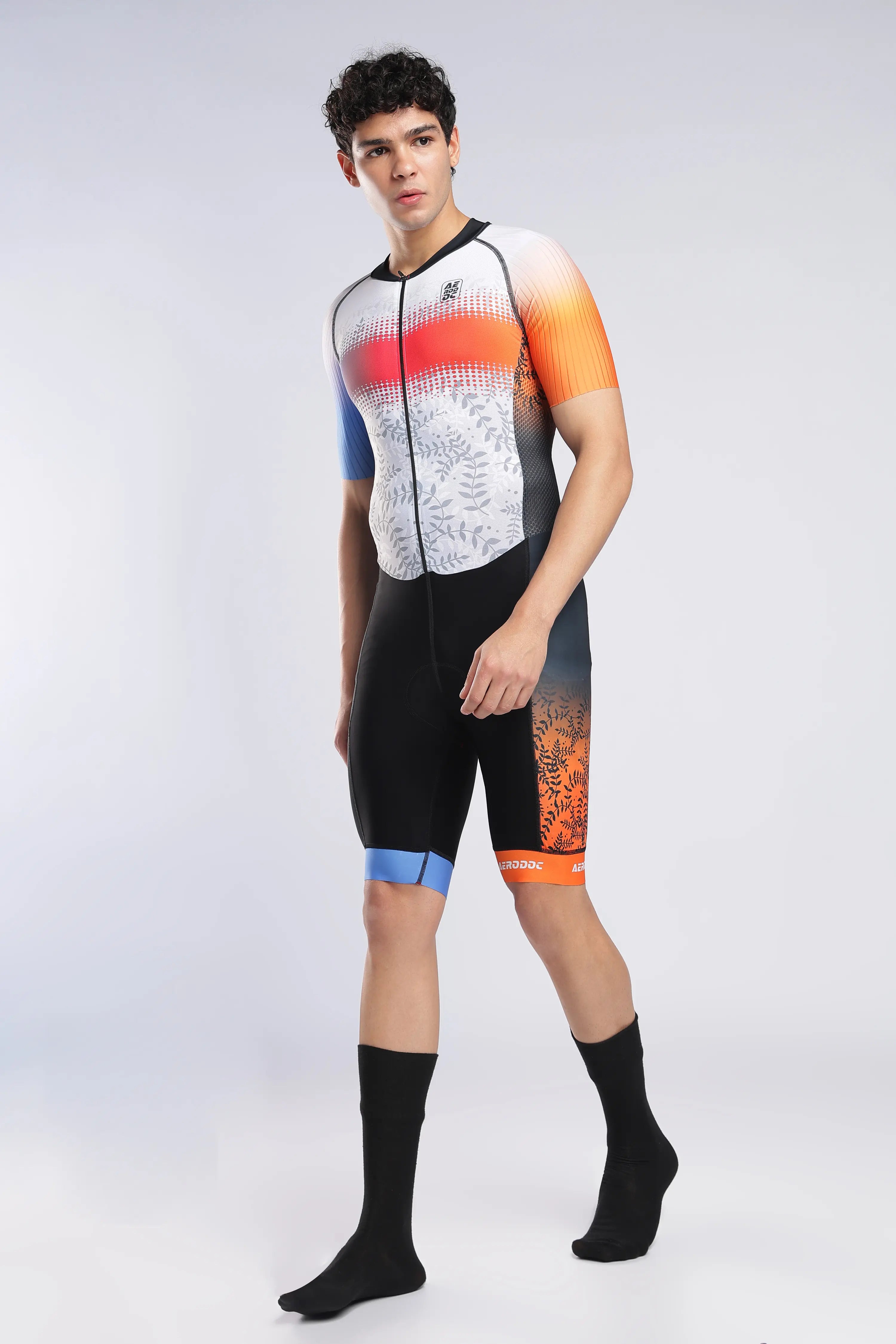 Aerodoc blazewave Tri Suit side view on male cycling model