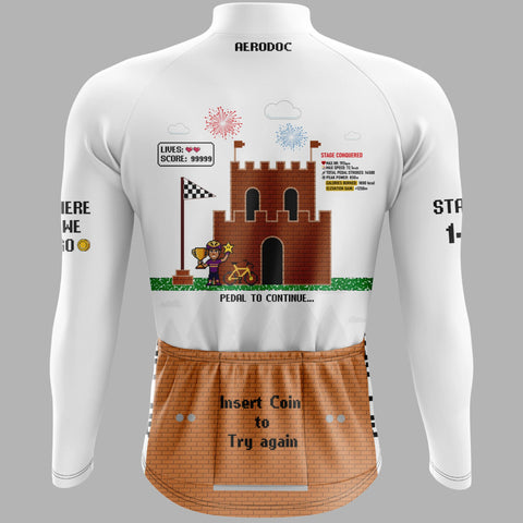 White long-sleeve cycling jersey shown from the back on a mannequin, featuring a retro pixel-art castle graphic with a coin character and text, plus a brown brick-look lower back panel with 'Insert Coin to Try again'.