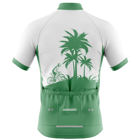 Green and white cycling jersey with palm tree design on a white background