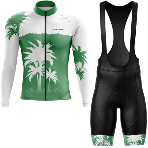 Cycling jersey with palm tree design and black bib shorts on a white background