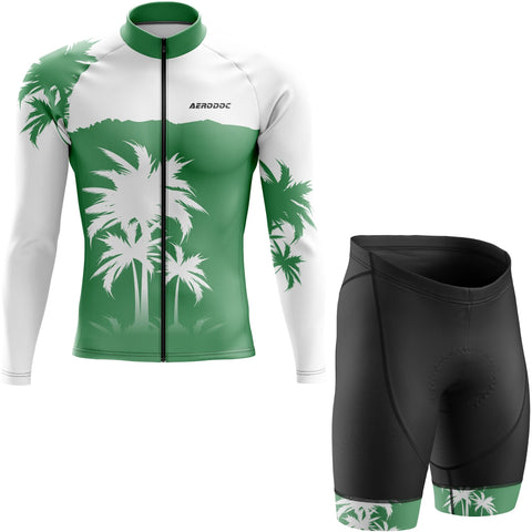 Cycling jersey with palm tree design and black shorts on a white background