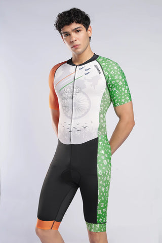 A male model wearing a AERODOC trisuit. The trisuit features a white center with a faint map graphic, orange sleeves, and green patterned sides, with the Indian flag colors (saffron, white, and green) running vertically.