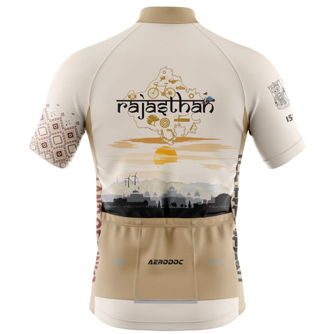 Beige cycling jersey with 'rajasthan' and landscape design on a white background