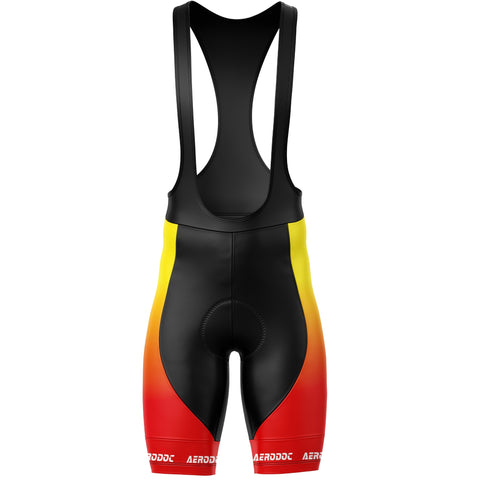 Cycling bib shorts with black, yellow, and red design on a white background