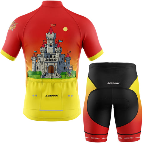 Cycling jersey with castle design and black shorts on a white background