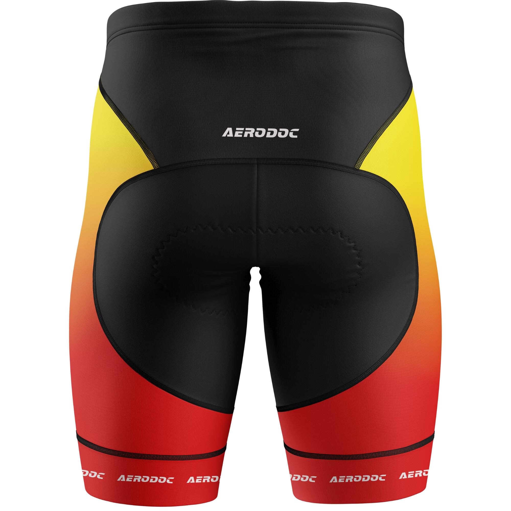 Black, yellow, and red cycling shorts with 'Aerodoc' branding on a white background