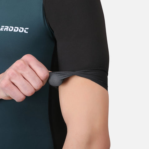 Close-up of the silicone gripper on the Mineral Green Triathlon Suit's leg band, ensuring a secure fit and preventing ride-up.