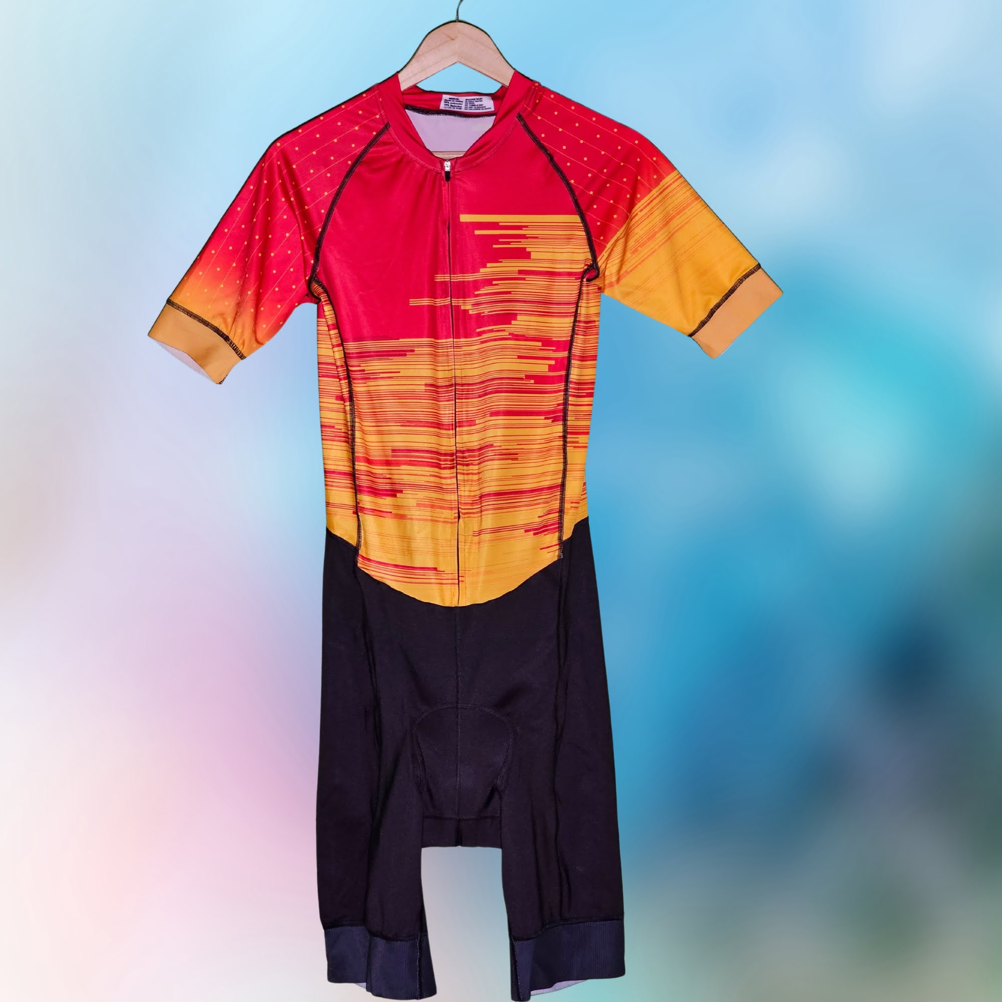 Front view of the Red-Yellow Triathlon Suit for men and women, designed for swimming, cycling, and running with a race-fit design and lightweight Lycra fabric.